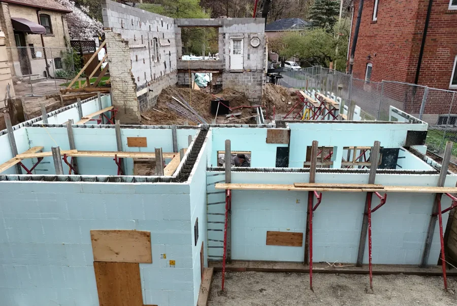 Insulated concrete form (ICF) foundation wall construction at a residential site